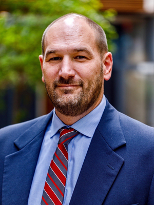 chris casola headshot liberty university flames senior associate athletic director for champion performance